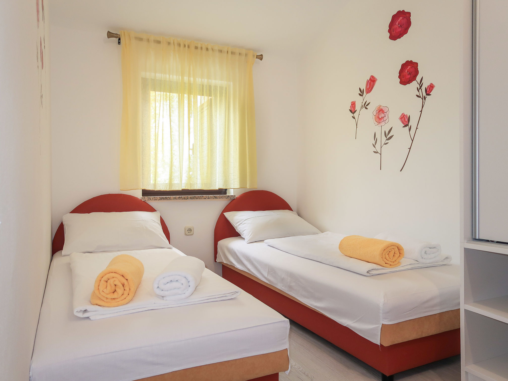 Foto 9 - Appartamento con 2 camere da letto a Baška con giardino e vista mare