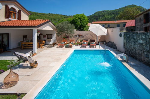 Photo 32 - Maison de 2 chambres à Lupoglav avec piscine privée et jardin