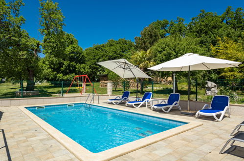 Photo 3 - Maison de 4 chambres à Labin avec piscine privée et jardin