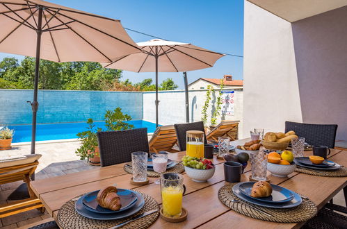 Photo 6 - Maison de 3 chambres à Poreč avec piscine privée et vues à la mer