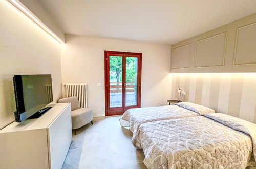 Foto 24 - Casa con 3 camere da letto a Lignano Sabbiadoro con piscina e giardino
