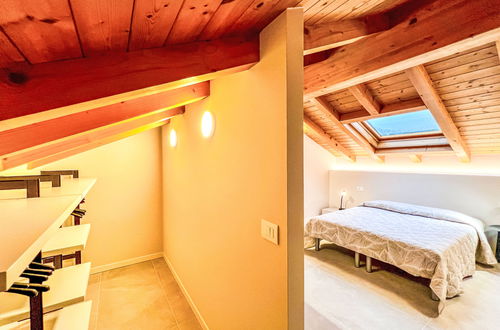 Foto 32 - Casa con 3 camere da letto a Lignano Sabbiadoro con piscina e giardino