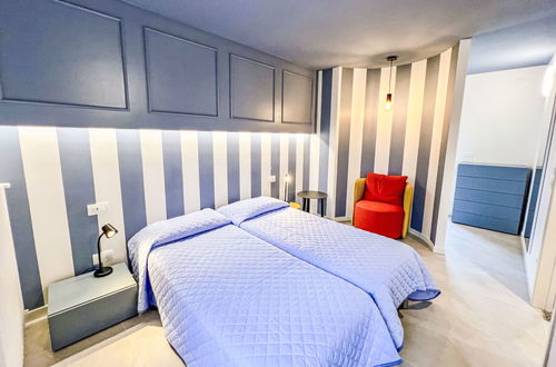 Foto 18 - Casa con 3 camere da letto a Lignano Sabbiadoro con piscina e giardino