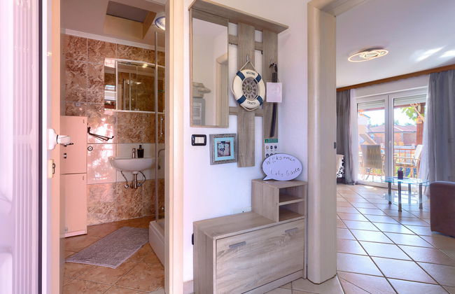 Apartamento de 2 quartos em Umag com piscina e jardim - Foto 16