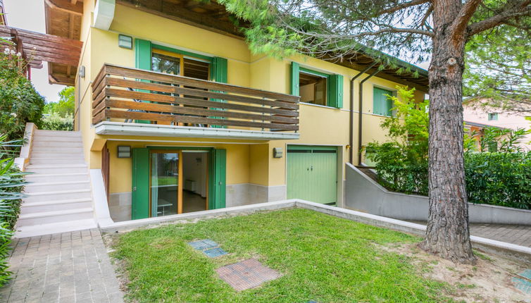 Photo 1 - Maison de 2 chambres à Lignano Sabbiadoro avec piscine et jardin