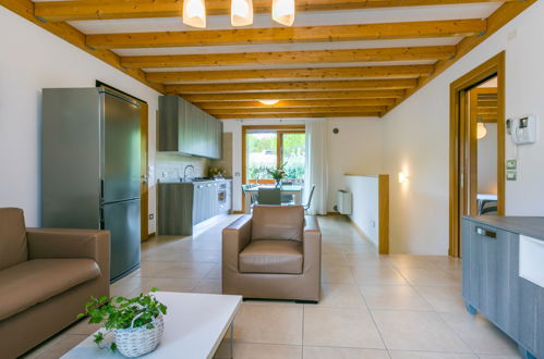 Foto 6 - Casa con 2 camere da letto a Lignano Sabbiadoro con piscina e vista mare