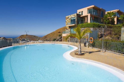 Photo 1 - Maison de 3 chambres à San Bartolomé de Tirajana avec piscine et vues à la mer