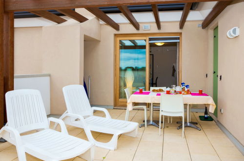 Foto 9 - Apartamento de 2 quartos em Caorle com piscina e jardim