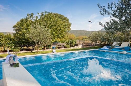 Photo 2 - Maison de 3 chambres à Seget avec piscine privée et vues à la mer