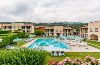 Photo 3 - Appartement de 2 chambres à Garda avec piscine et vues sur la montagne