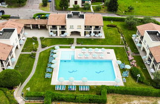 Foto 2 - Apartamento de 2 quartos em Garda com piscina e jardim