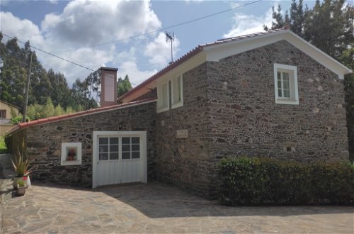 Foto 21 - Casa con 3 camere da letto a Miño con giardino e vista mare