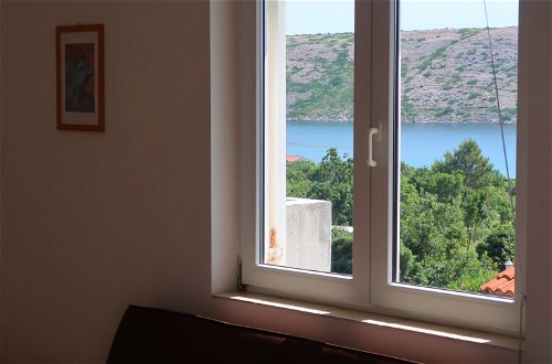 Foto 14 - Apartamento de 2 quartos em Rab com vistas do mar