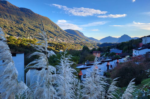 Foto 5 - Appartamento con 2 camere da letto a Capriasca con piscina e vista sulle montagne