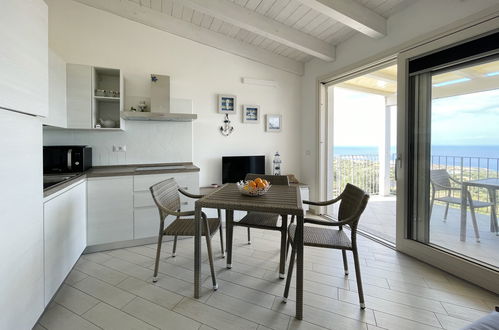 Foto 3 - Apartamento de 1 habitación en Trinità d'Agultu e Vignola con piscina y vistas al mar