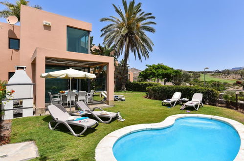 Photo 1 - Maison de 3 chambres à San Bartolomé de Tirajana avec piscine privée et vues à la mer