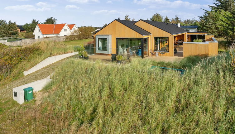 Photo 1 - Maison de 4 chambres à Blokhus avec terrasse et sauna