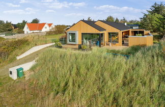 Photo 1 - Maison de 4 chambres à Blokhus avec terrasse et sauna