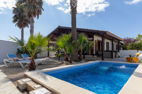 Foto 1 - Casa con 3 camere da letto a Deltebre con piscina privata e giardino
