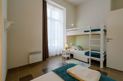 Foto 10 - Appartamento con 2 camere da letto a Baden con piscina e vista mare