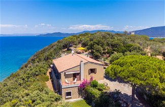 Foto 1 - Casa de 6 habitaciones en Castiglione della Pescaia con jardín y vistas al mar