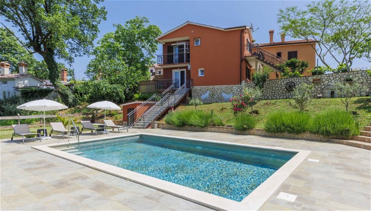 Foto 1 - Apartamento de 1 quarto em Raša com piscina privada e vistas do mar