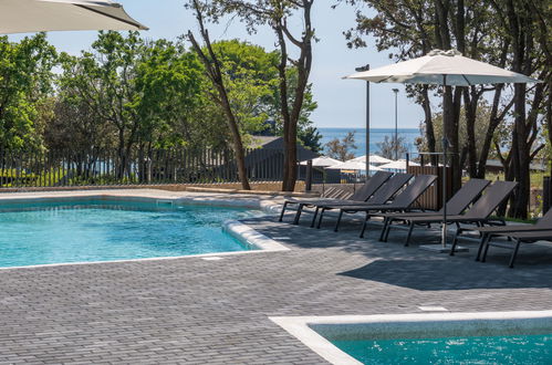 Photo 30 - Maison de 2 chambres à Bale avec piscine privée et vues à la mer