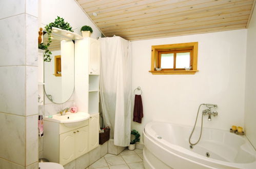 Photo 9 - Maison de 4 chambres à Blokhus avec terrasse et sauna