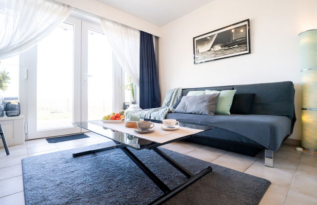 Apartamento de 2 quartos em De Haan com piscina e jardim - Foto 11