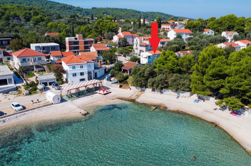 Photo 2 - Appartement de 2 chambres à Pašman avec jardin et vues à la mer