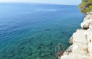 Foto 2 - Appartamento con 1 camera da letto a Omiš con terrazza e vista mare