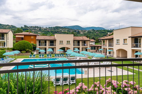 Foto 17 - Apartamento de 1 habitación en Garda con piscina y vistas a la montaña