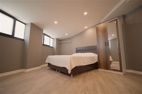 Foto 5 - SAS Suite Rooms