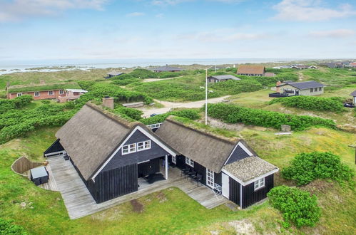 Photo 1 - Maison de 3 chambres à Rindby Strand avec terrasse et sauna