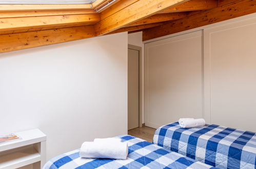 Foto 27 - Appartamento con 2 camere da letto a Musso con vista sulle montagne