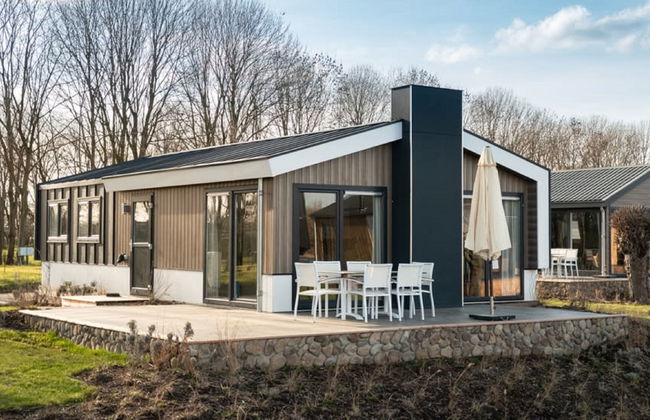 Casa de 4 quartos em Kerkdriel com terraço e sauna - Foto 1