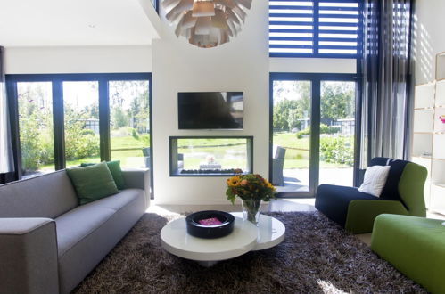 Photo 2 - Maison de 2 chambres à Nijkerk avec terrasse et sauna