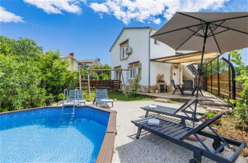 Foto 1 - Casa con 3 camere da letto a Marčana con piscina privata e vista mare