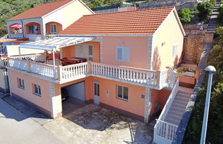 Foto 2 - Casa con 2 camere da letto a Blato con terrazza e vista mare