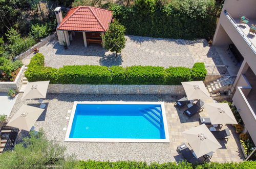Foto 56 - Casa de 4 quartos em Dobrinj com piscina privada e jardim