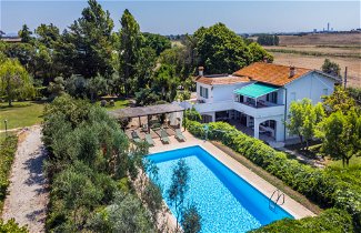 Foto 1 - Casa de 4 habitaciones en Montalto di Castro con piscina privada y jardín