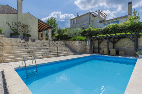 Foto 37 - Casa con 2 camere da letto a Buje con piscina privata e giardino