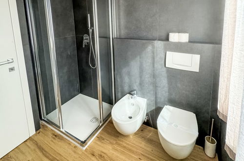 Foto 19 - Appartamento con 2 camere da letto a Ledro con piscina e giardino