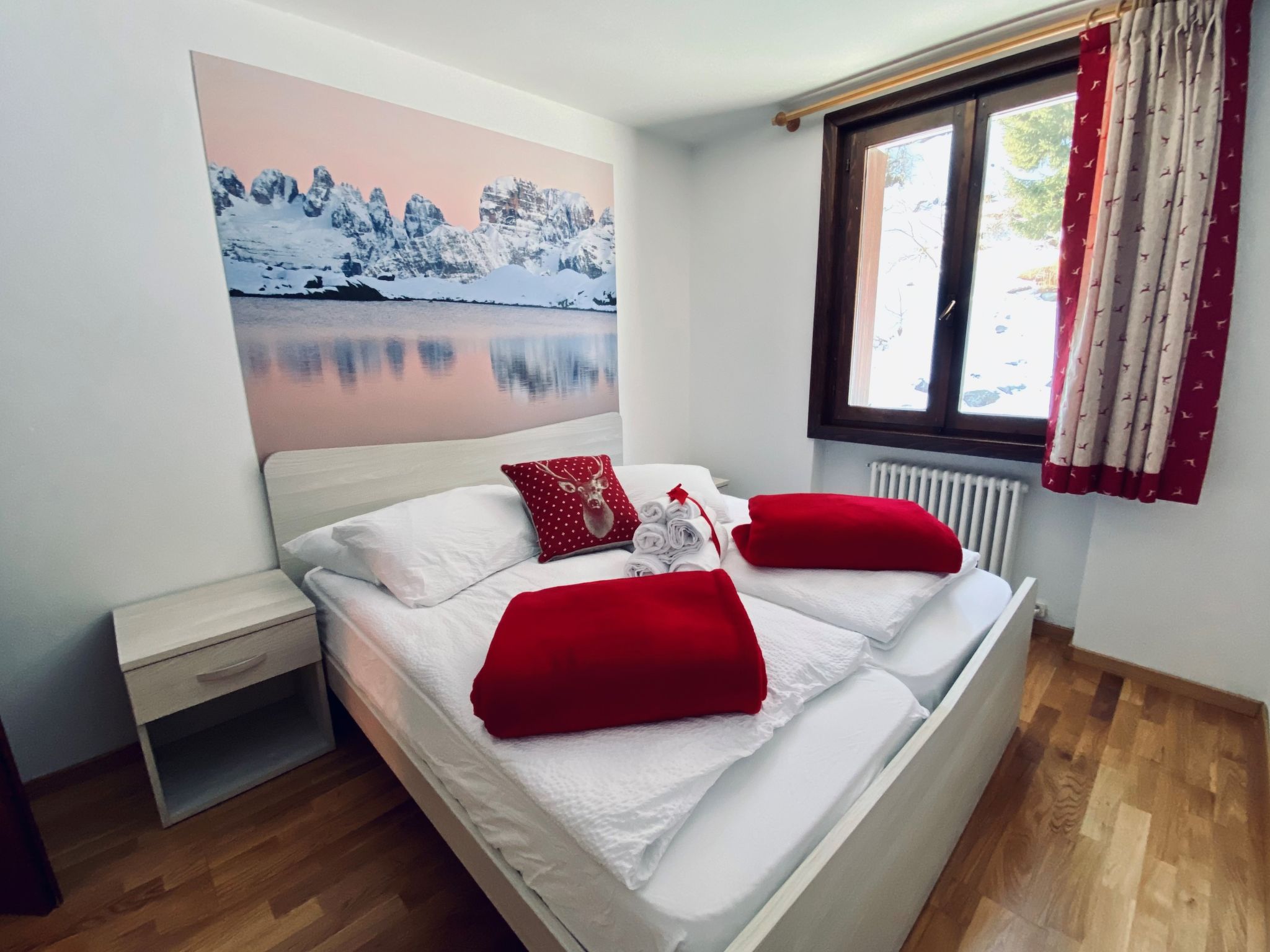 Foto 4 - Appartamento con 2 camere da letto a Pinzolo con giardino e vista sulle montagne