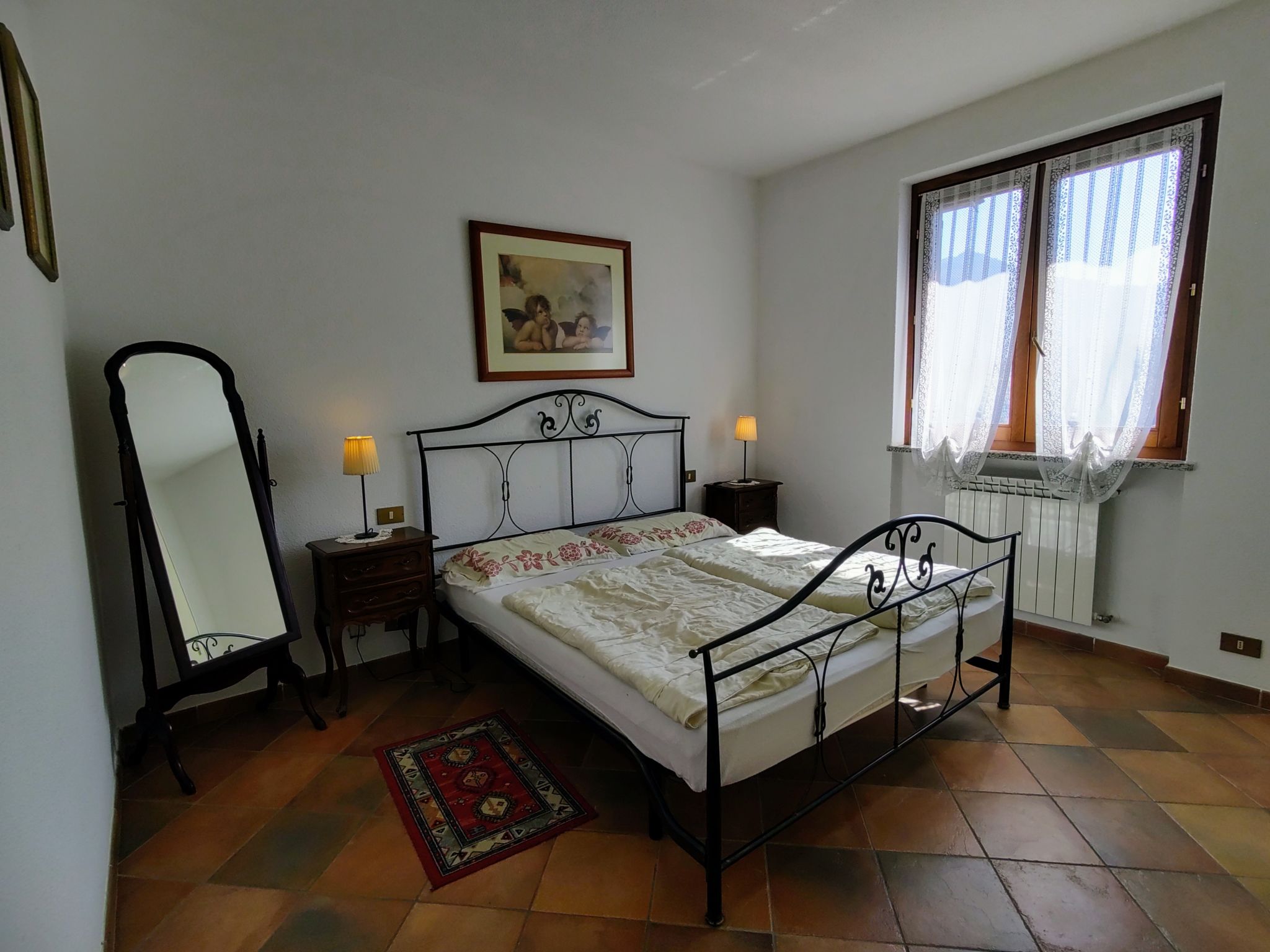 Foto 6 - Appartamento con 2 camere da letto a Castelveccana con piscina e vista sulle montagne