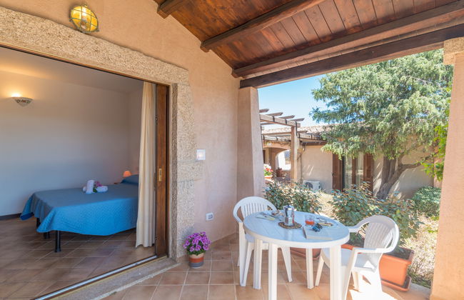 Casa de 1 quarto em Loiri Porto San Paolo com piscina e jardim - Foto 1