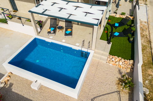 Foto 44 - Casa con 4 camere da letto a Milna con piscina privata e vista mare