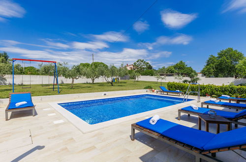 Foto 6 - Casa con 3 camere da letto a Marčana con piscina privata e giardino