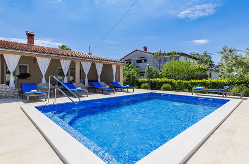 Foto 7 - Casa con 3 camere da letto a Marčana con piscina privata e giardino