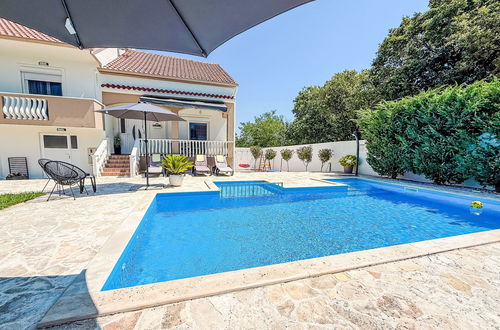 Foto 34 - Casa de 5 quartos em Poličnik com piscina privada e jardim